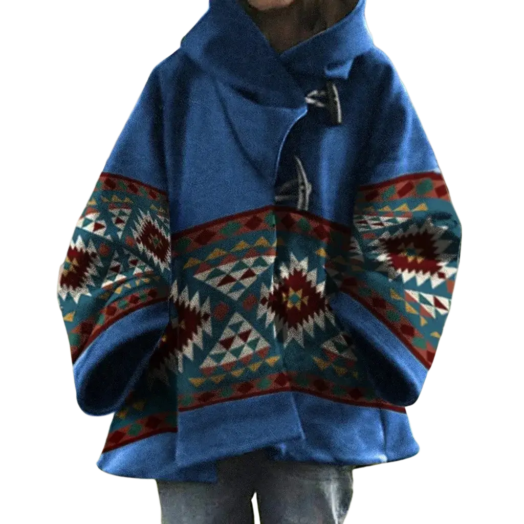 Blue woolen hooded poncho coat with geometric tribal patterns in red teal and white displayed from the back side