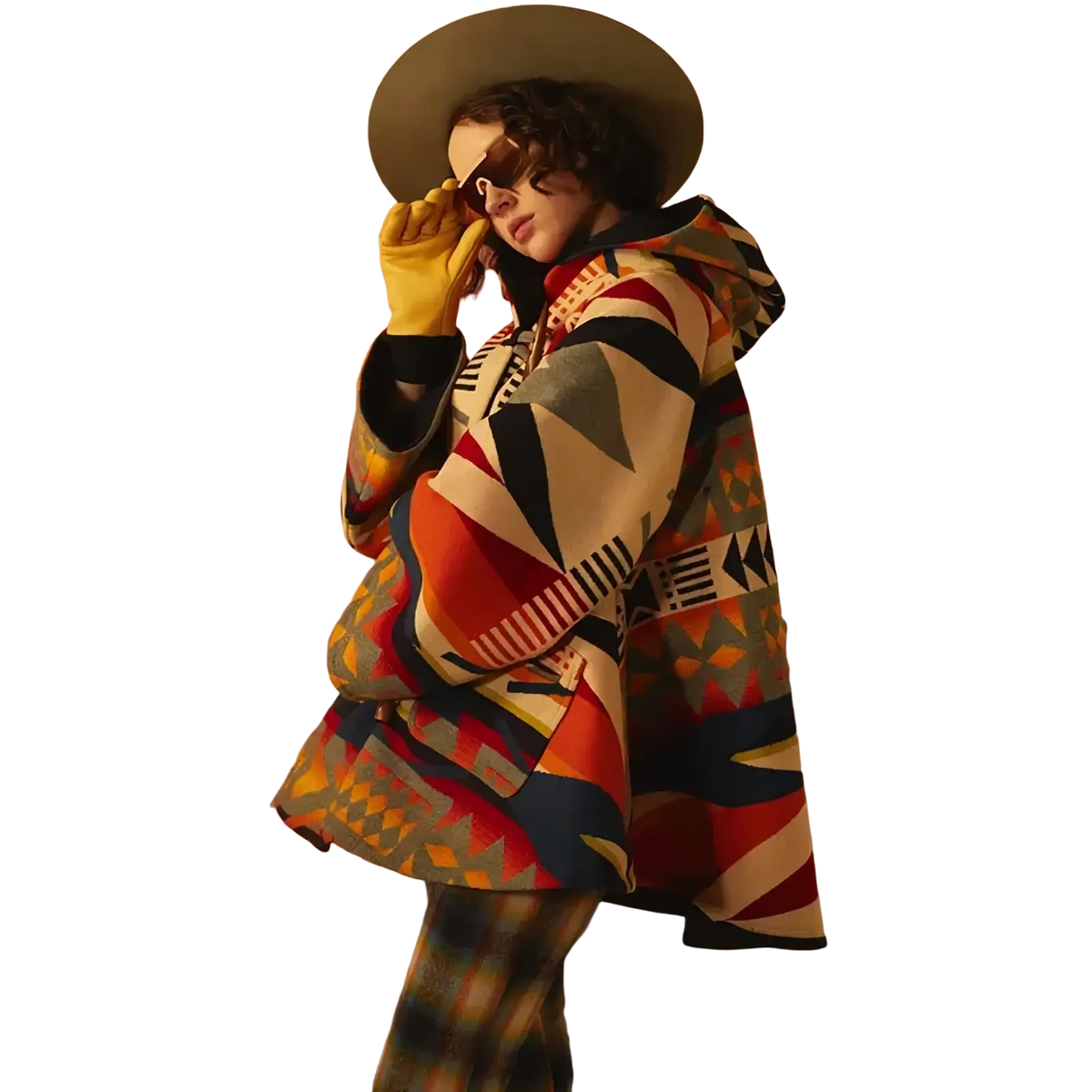 A vibrant geometric printed woolen hooded coat in bold reds blues and cream tones with a woolen texture