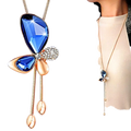 Elegant blue and gold butterfly pendant necklace with geometric rhinestones and sparkling crystal accents for women