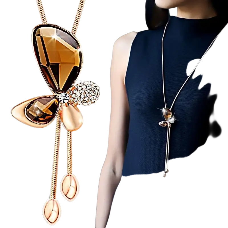 Gold-toned butterfly pendant necklace with faceted amber stones and crystal embellishments for women