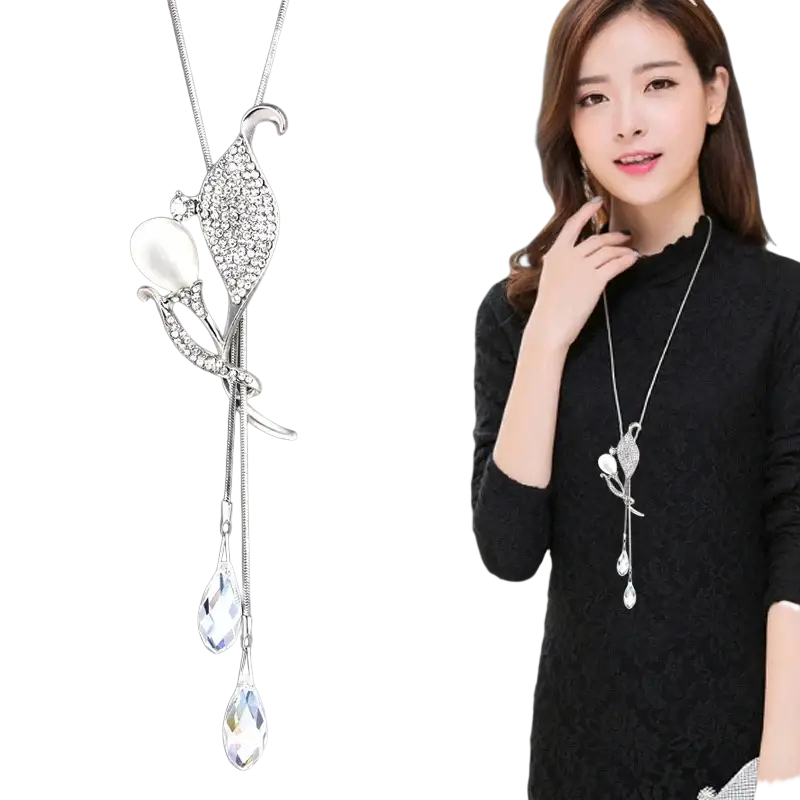Silver bird-shaped pendant necklace with sparkling crystals and teardrop charms geometric rhinestone statement necklace for women