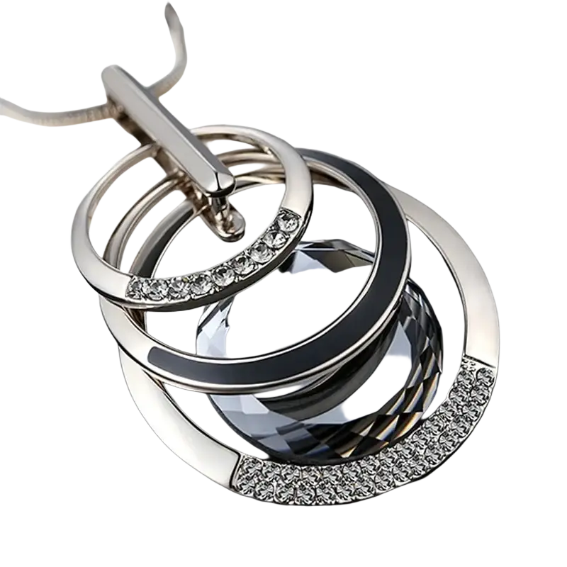 Silver and black layered keychain with crystal accents complementing a geometric rhinestone statement necklace for women