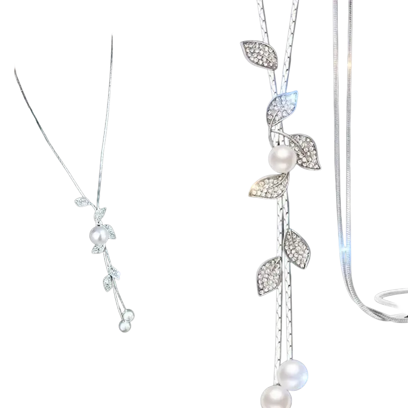 Silver leaf and pearl pendant necklace with sparkling crystal leaves and dangling white pearls from geometric rhinestone statement collection for women