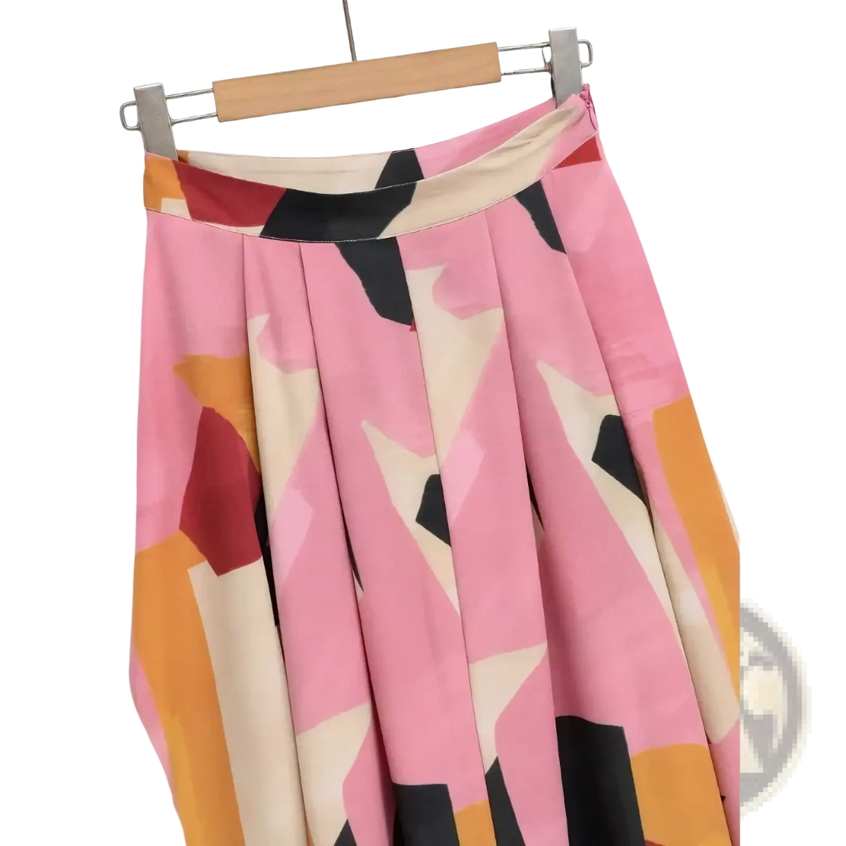 Pleated pink geometric satin midi skirt with bold abstract black orange and beige pattern