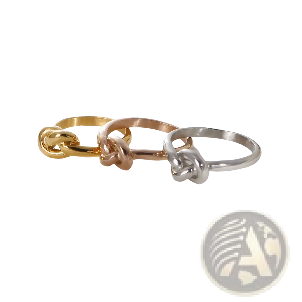 Three geometric truelove knot titanium steel rings in gold rose gold and silver finishes