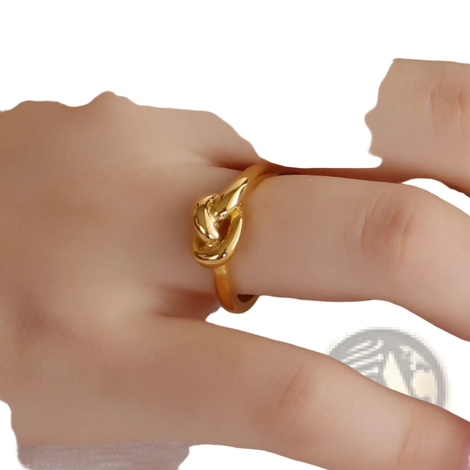 A sleek gold geometric truelove knot ring with a polished interwoven design made of titanium steel