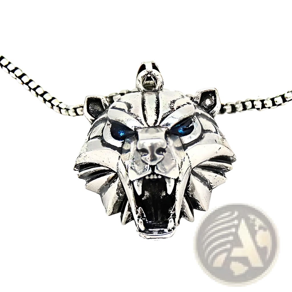 Silver tiger head pendant necklace with blue inlaid eyes and fierce textured design in geometric wild game style