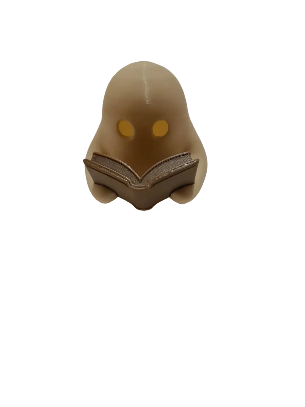 A beige translucent ghost reading book figurine with glowing yellow eyes holding an open book and flickering tealight