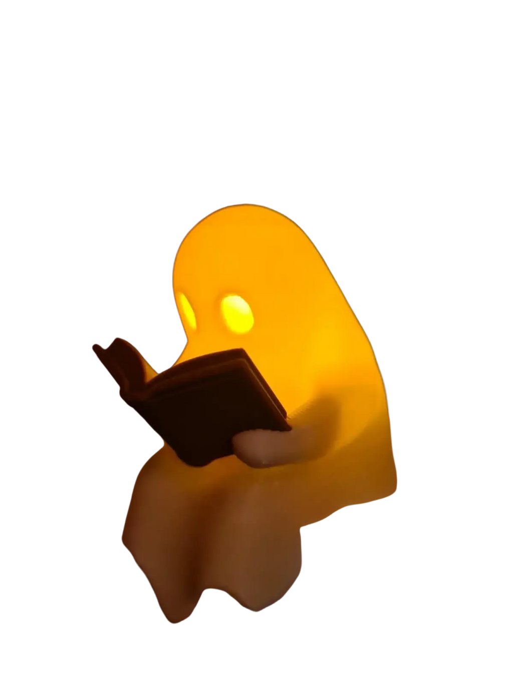 A glowing yellow ghost reading book figurine nightlight with flickering tealight for ambient decoration