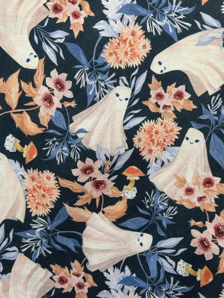 Dark navy cotton midi fit and flare dress with whimsical cream ghosts floral pattern and delicate blue leaves