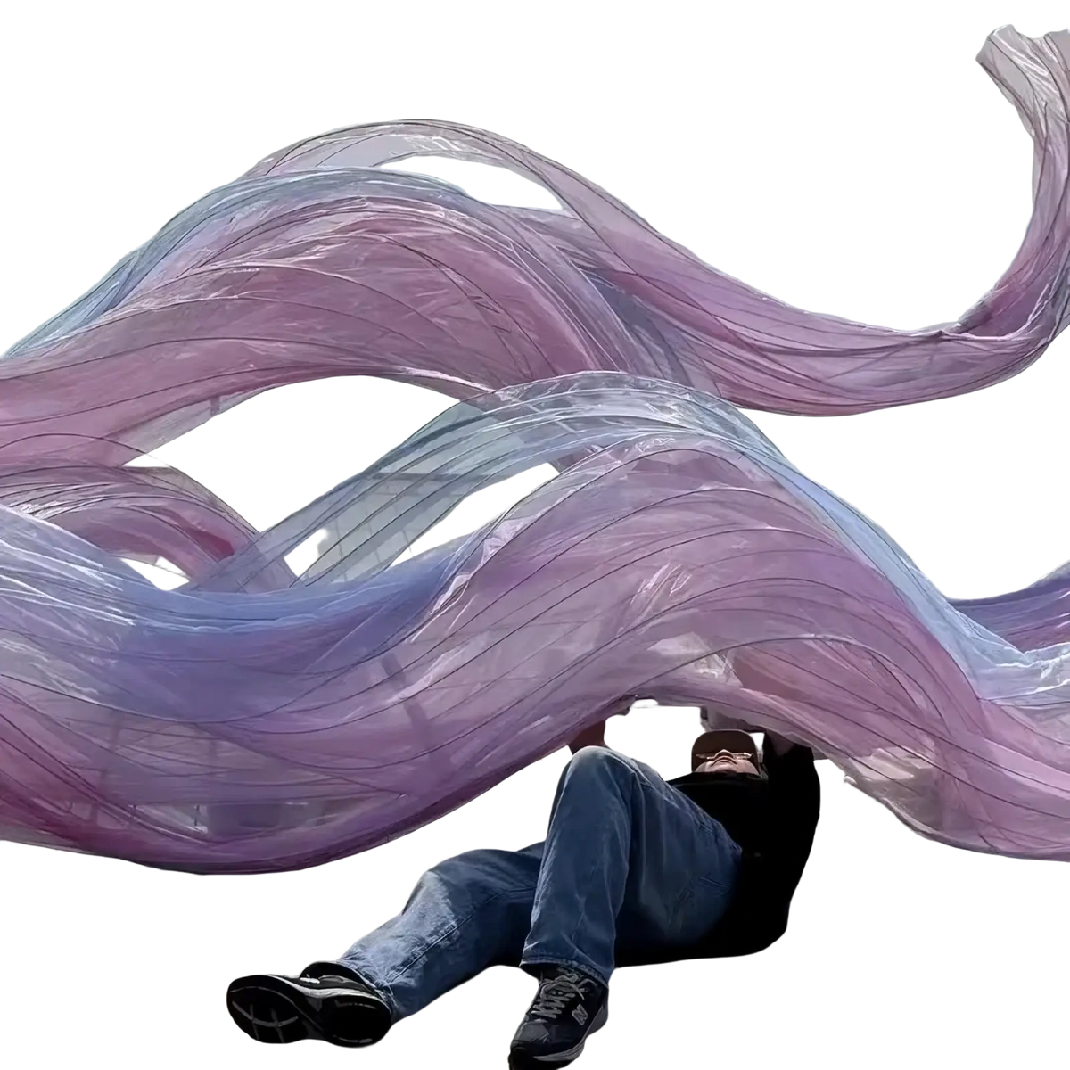 A flowing translucent purple and lavender sheer fabric sculpture with wavy ribbon design for giant gauze flower streamer backdrop decor