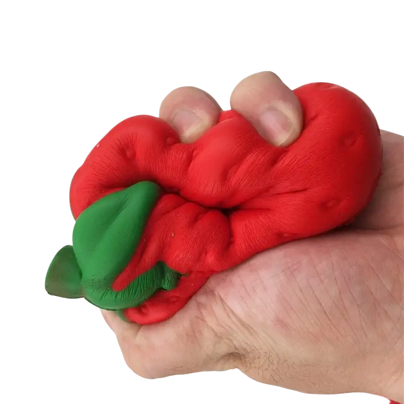 Red and green pepper-shaped soft silicone stress ball for stress relief in giant strawberry slow rising squishy toy design