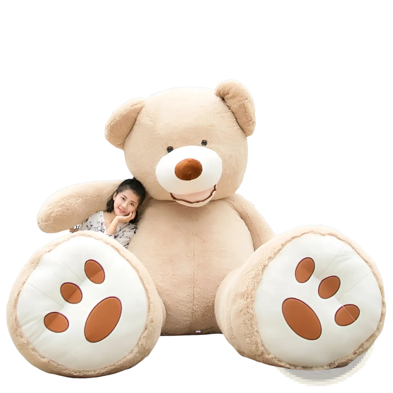 A giant teddy bear plush soft stuffed animal toy in light beige with white snout and embroidered paw prints