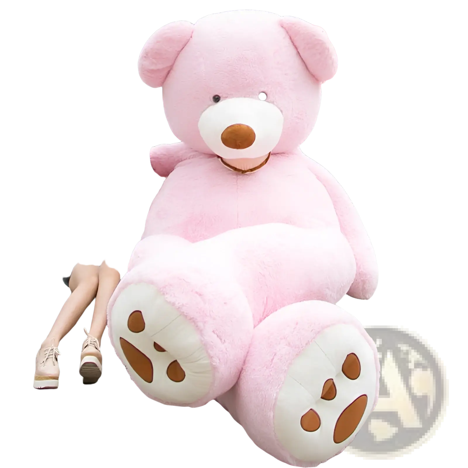 A plush pink giant teddy bear with white paws and a brown nose sitting on steps in soft stuffed animal toy form