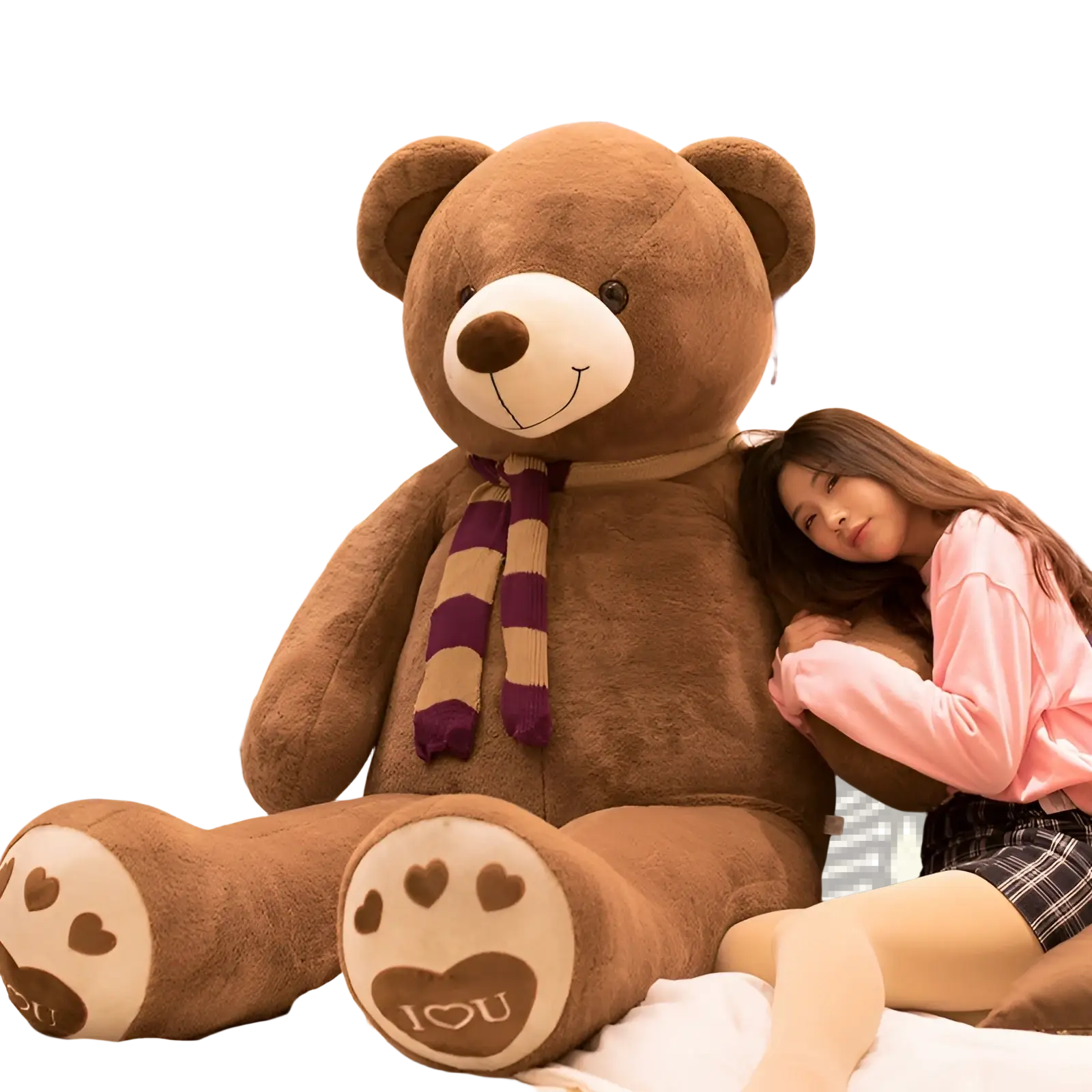 Giant brown plush teddy bear with white snout heart-patterned paws and purple beige striped scarf soft toy