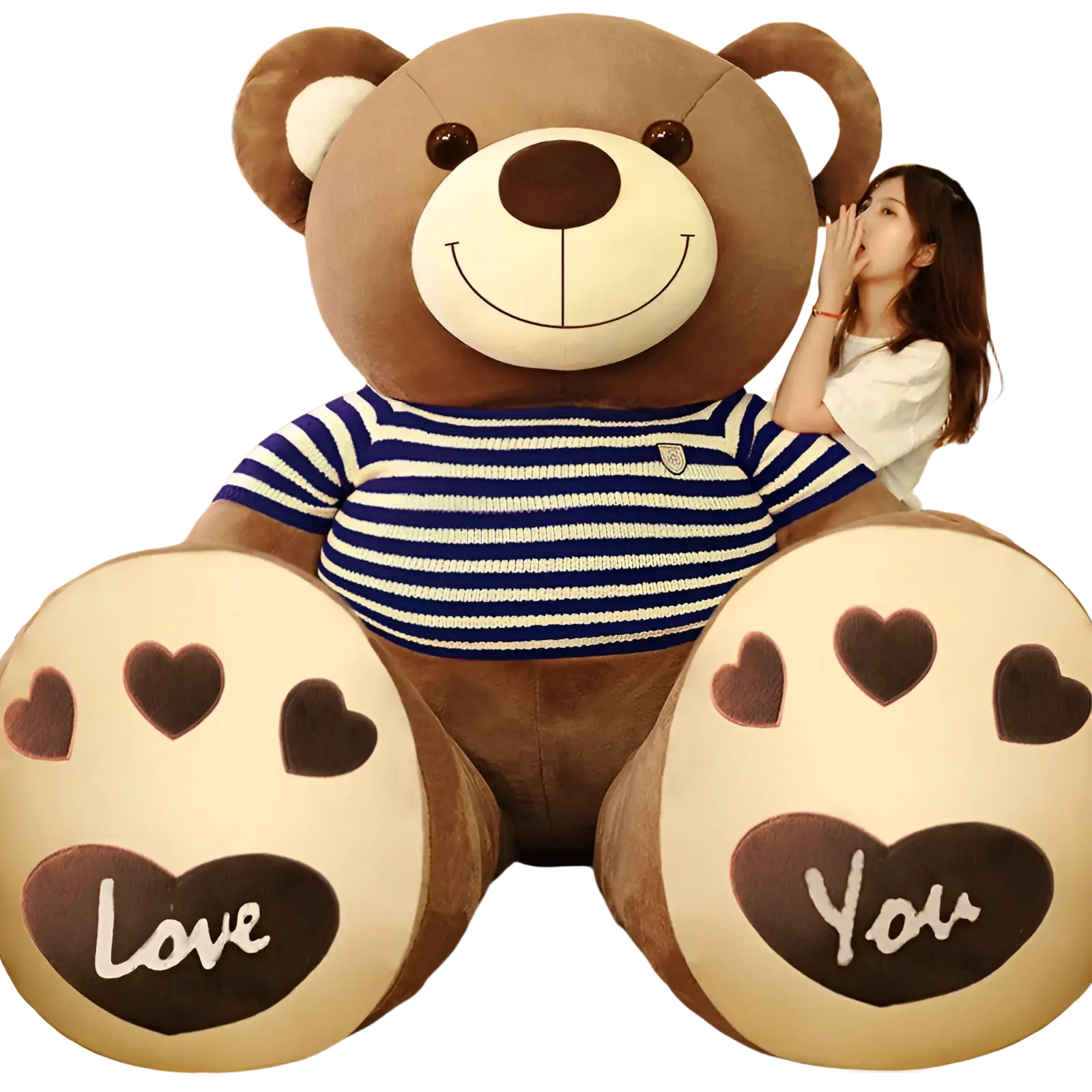 A plush brown giant teddy bear wearing a blue and white striped knit shirt with paws spelling love you in heart designs