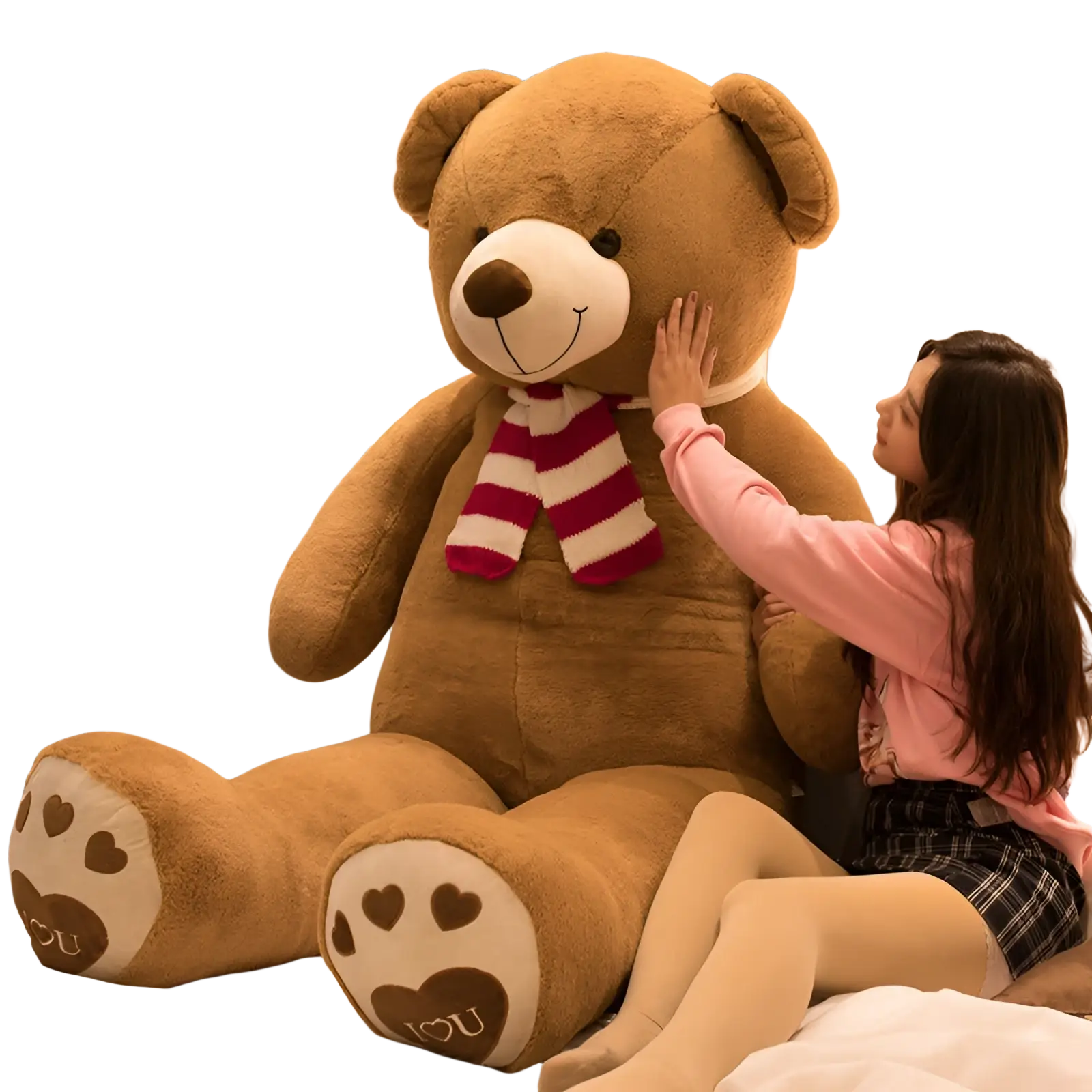 Giant plush brown teddy bear with white snout, red and white striped scarf, and heart patterned paw pads saying you