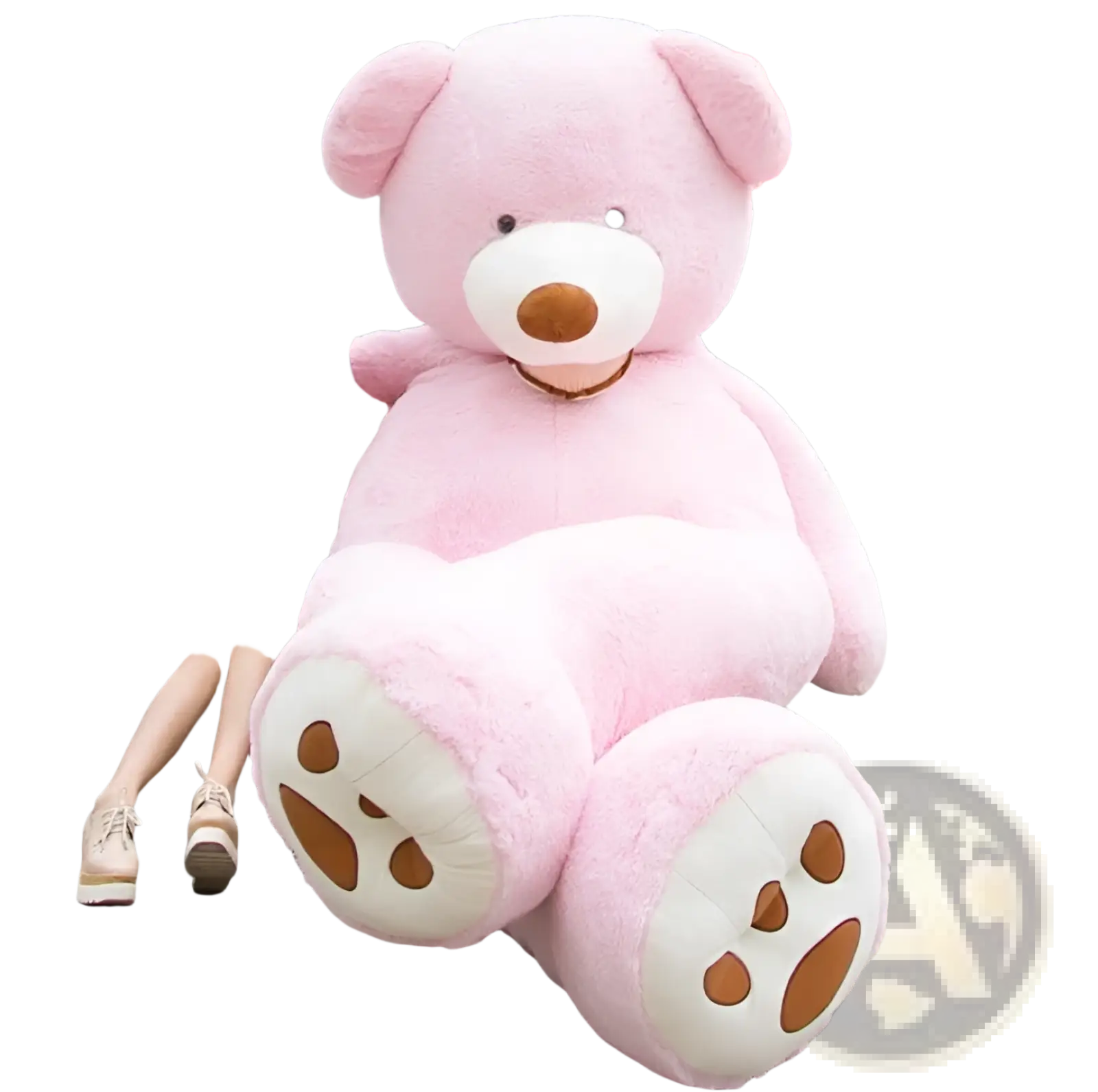 A plush pink giant teddy bear plush toy with white paws brown paw pads unfilled leather shell sitting on steps