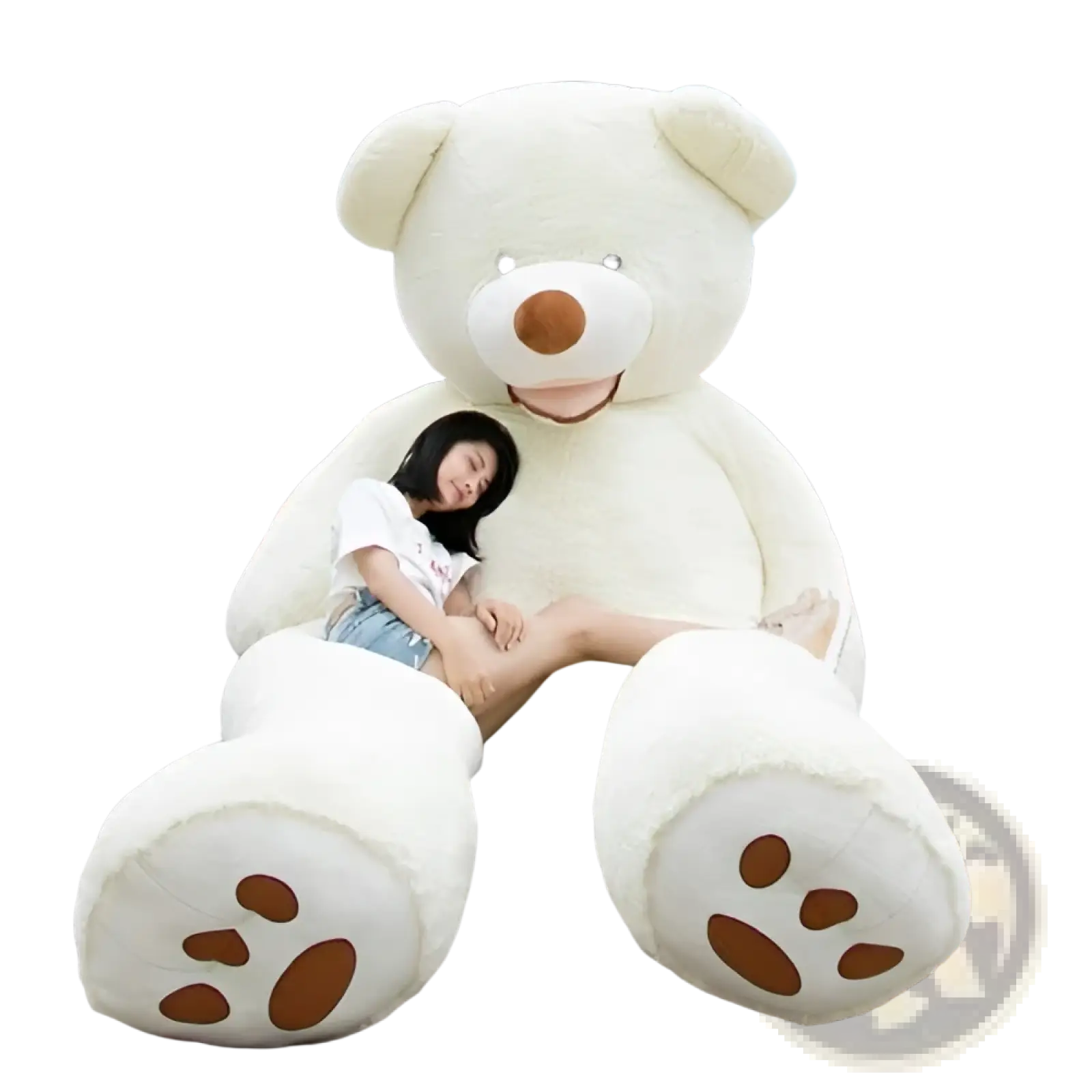 Cream-colored giant teddy bear plush toy with brown nose and paw prints sitting on steps unfilled leather shell