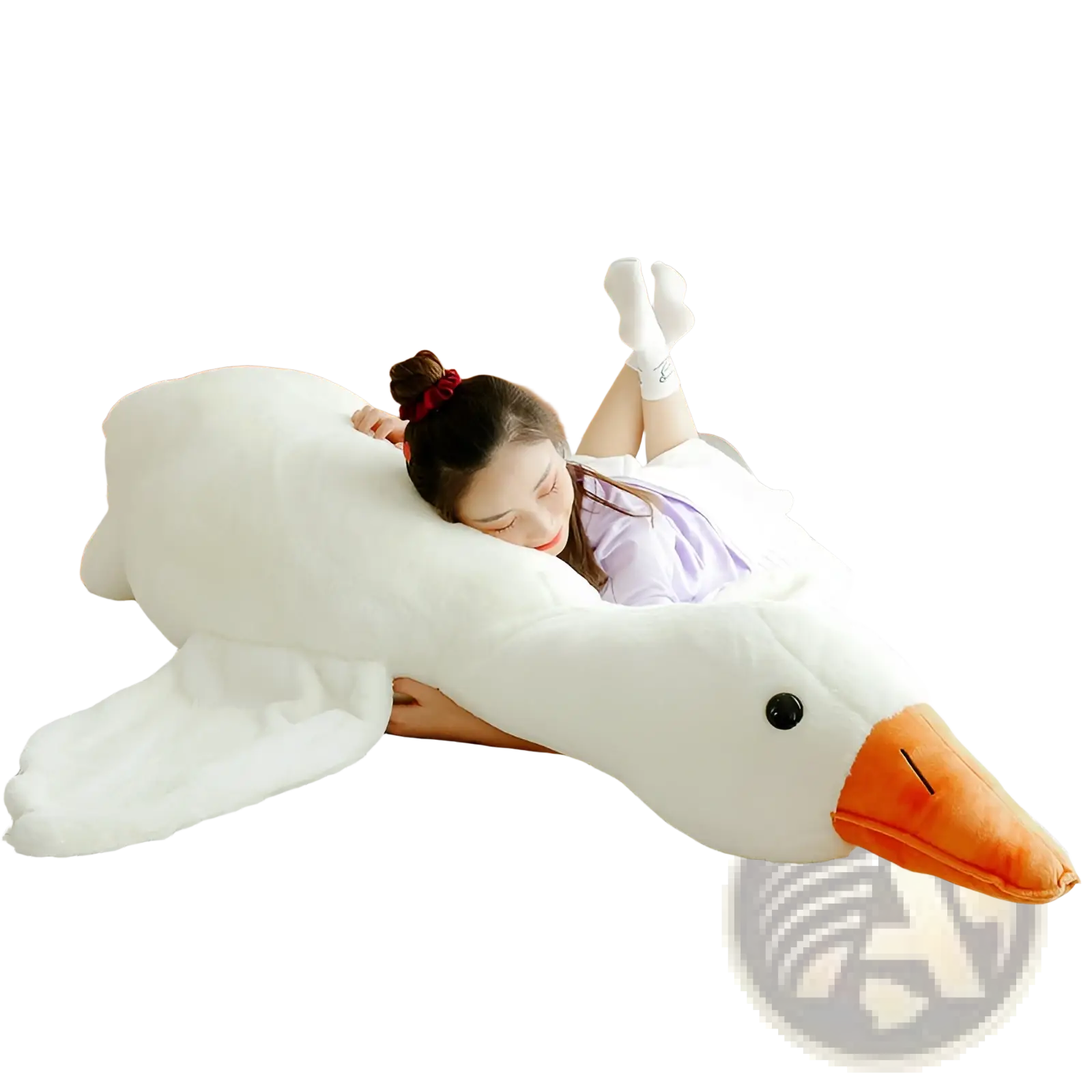 A giant white goose plush body pillow toy with orange beak and black eye lying on a bed