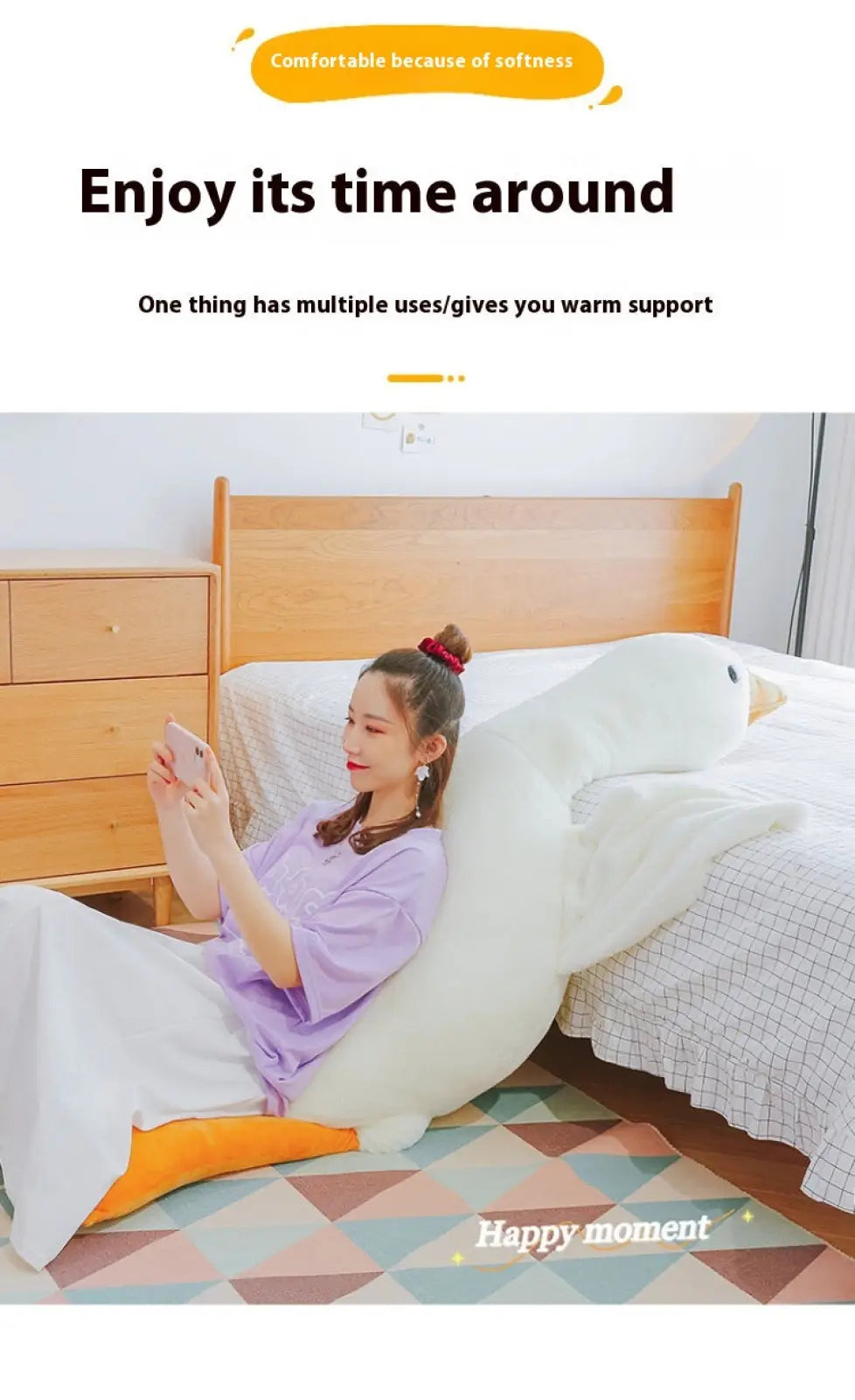 A giant white goose plush body pillow toy shaped like a white and orange duck with soft cuddly texture