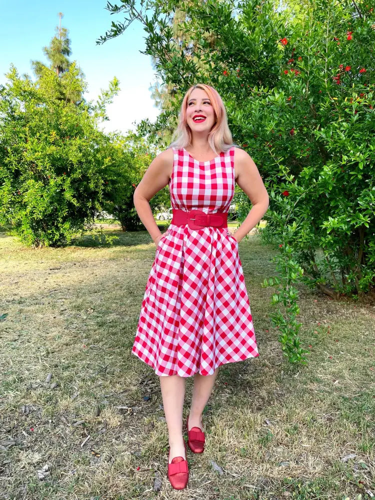 Red gingham 1950s vintage cotton midi swing dress with fitted bodice flared skirt and matching belt in red and white
