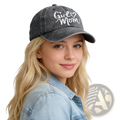 A dark gray distressed adjustable baseball cap with girl mom embroidered in white cursive script