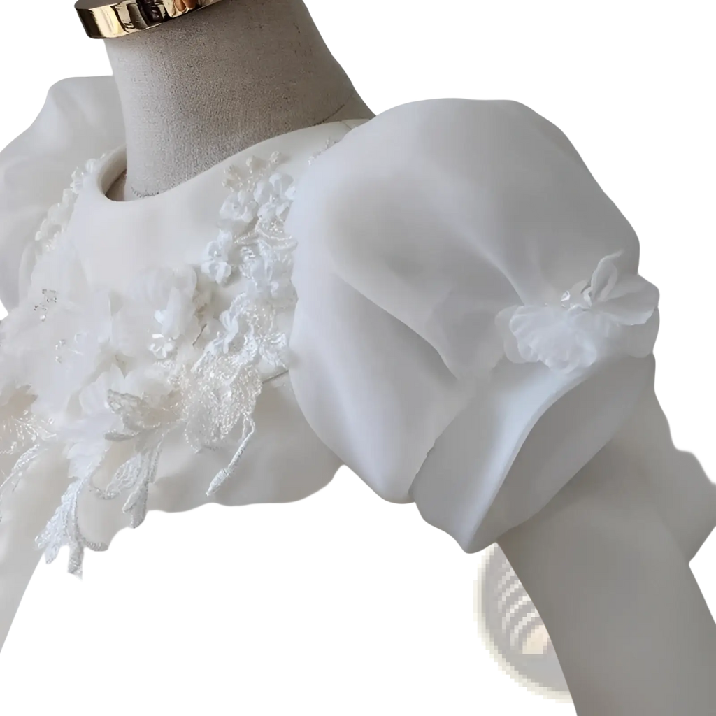 Girls white lace floral princess wedding dress with delicate organza flowers and voluminous puff sleeve detail