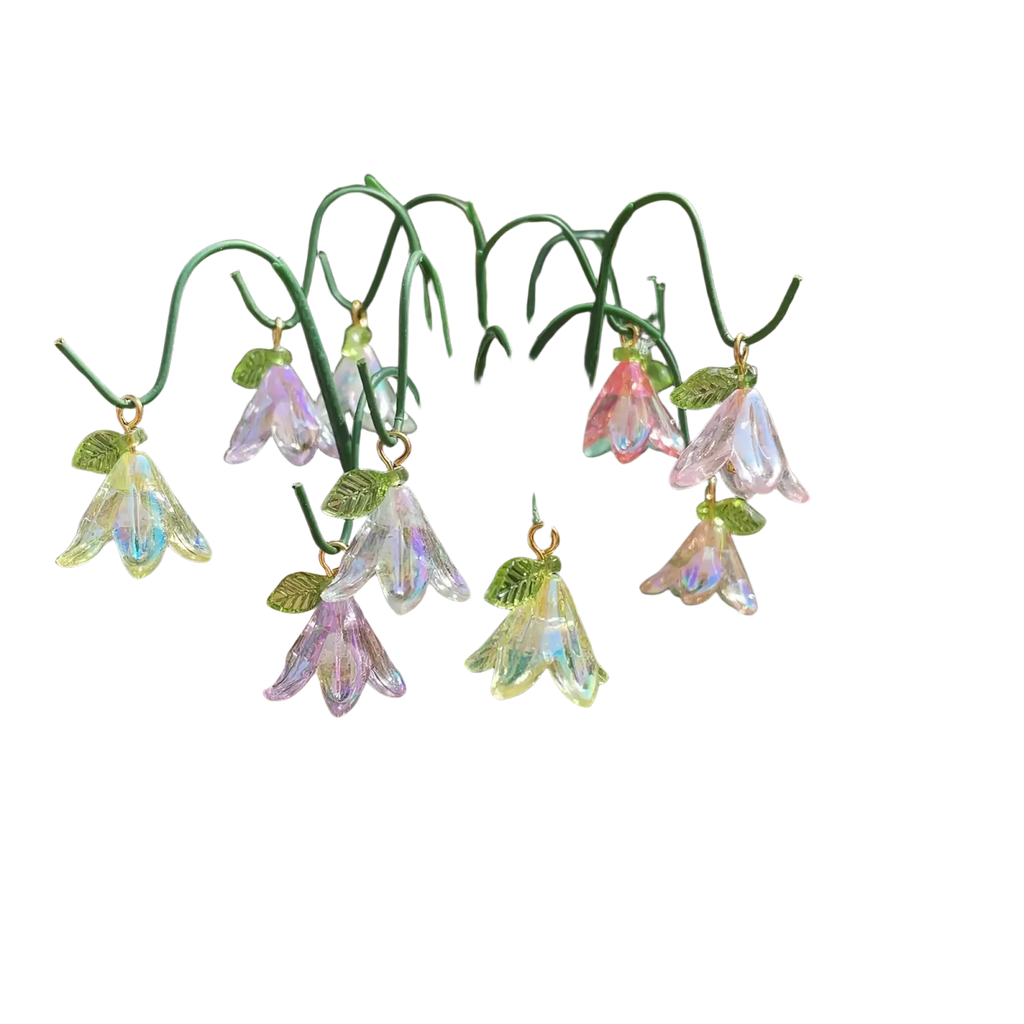 Glass lily garden stakes plant decor featuring iridescent glass bell-shaped flowers with green leaves on wire stems