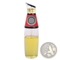 Glass oil dispenser with precision measuring cup featuring a clear glass body and red and black measuring top
