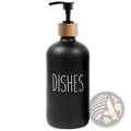 Black matte glass soap dispenser with bamboo pump and dishes label in a glass soap dispenser set with bamboo tray