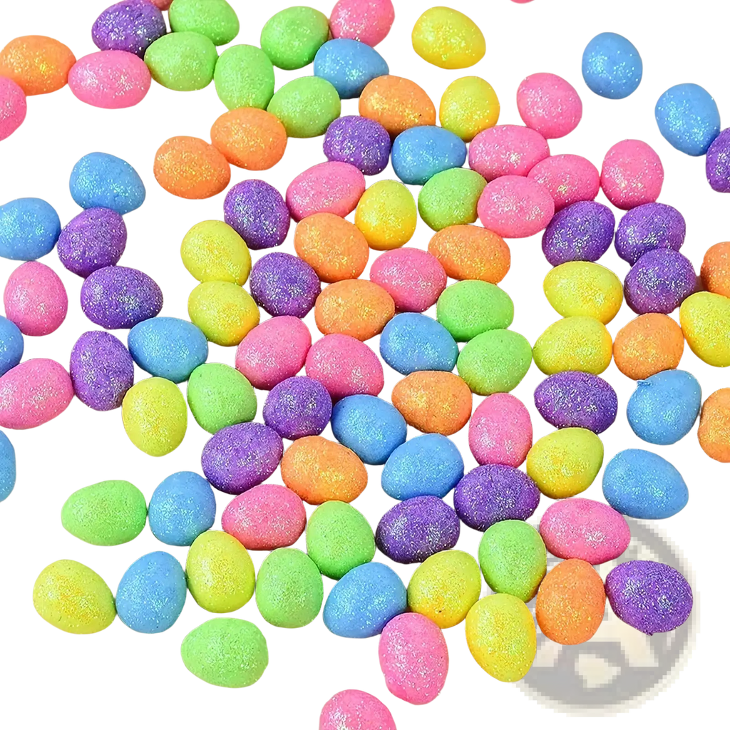 A collection of colorful glitter easter foam eggs in pink blue green yellow orange and purple for diy party decor