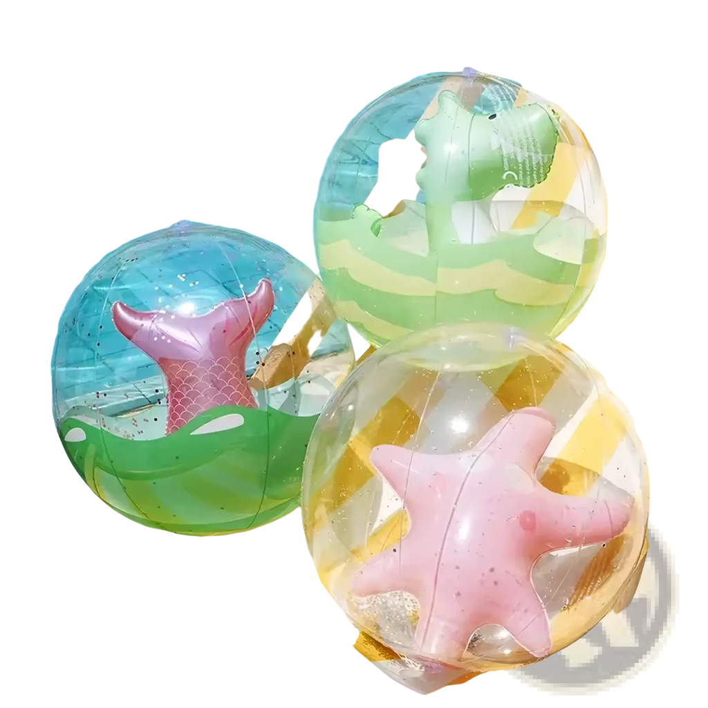 Clear inflatable beach balls with colorful whimsical sea creature designs including a pink mermaid tail and starfish