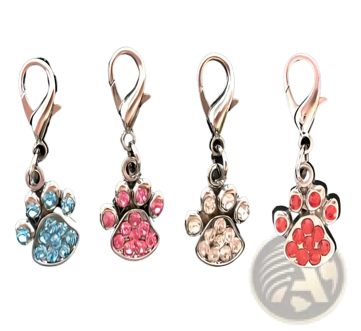 Four glitter paw print metal dog tags with silver-toned clasps and rhinestone paw pendants in blue pink clear and red