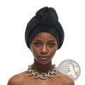 Black textured glitter turban headwrap for women styled in a high elegant knot suitable for Nigerian wedding party