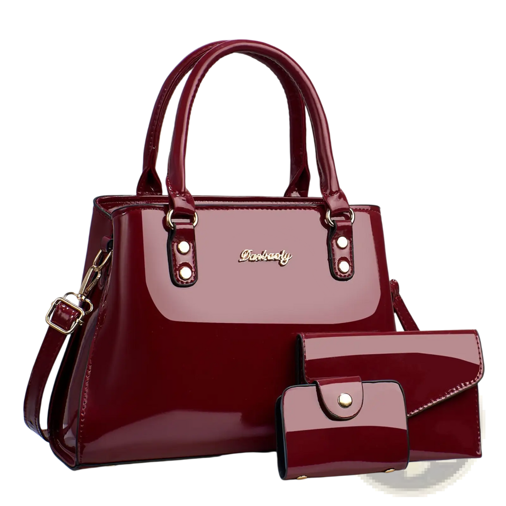 Glossy patent leather 3-piece handbag and wallet set in burgundy with gold-tone hardware including wallet and clutch