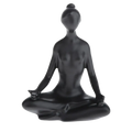 Black glossy resin yoga figurine set of a woman in meditative pose with hair styled in a top knot