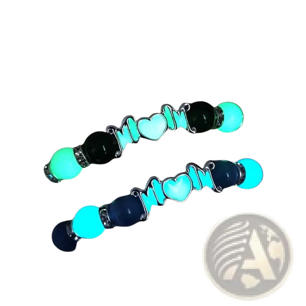 Two glow in the dark mom bracelets with black and blue beads featuring silver heart-shaped charms glowing softly