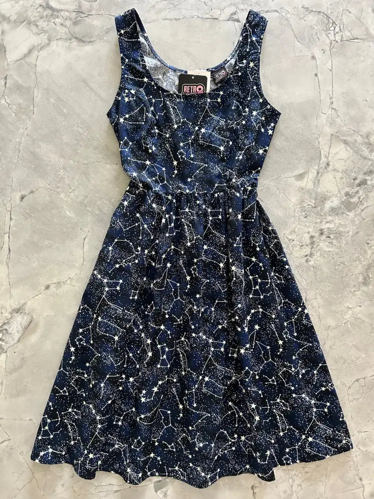 Navy blue sleeveless midi dress with glow in the dark white constellation print and gathered waist with pockets