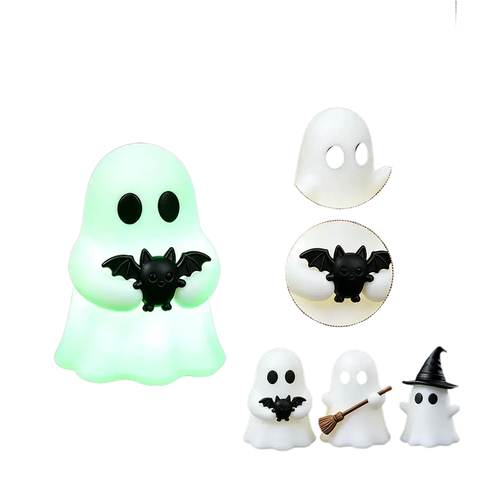A glowing green ghost-shaped nightlight with a black bat on its shoulder designed as Halloween desktop decor