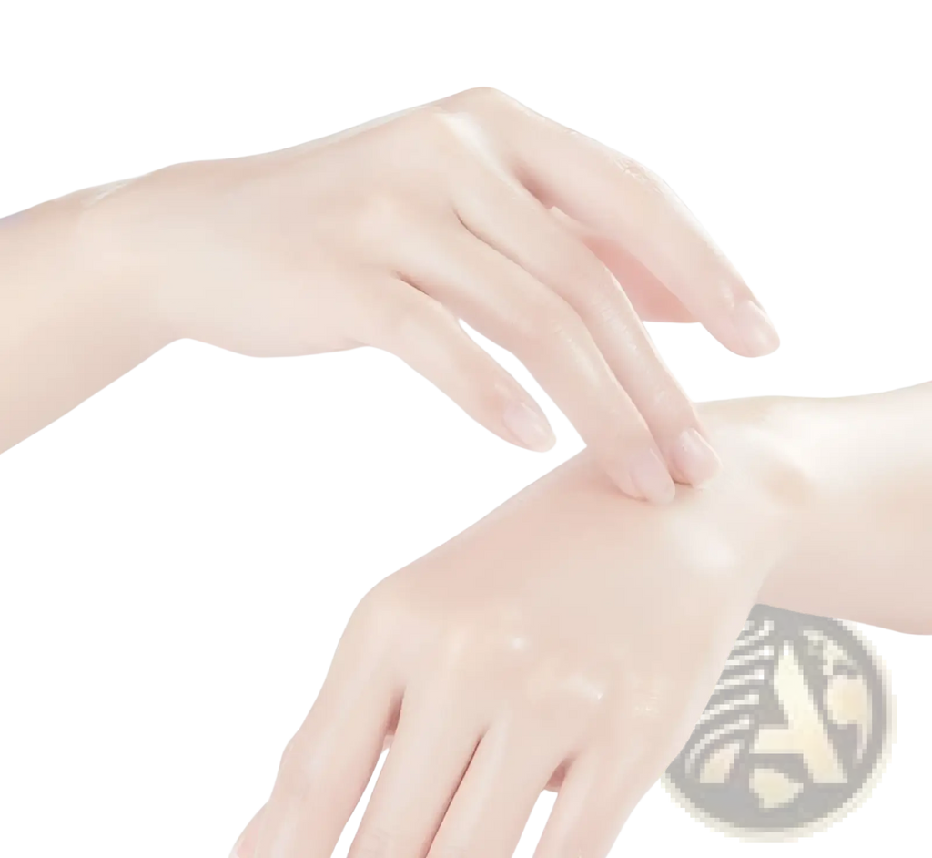 A pair of hands gently applying clear glossy goat milk niacinamide hand mask whitening moisturizer to the skin
