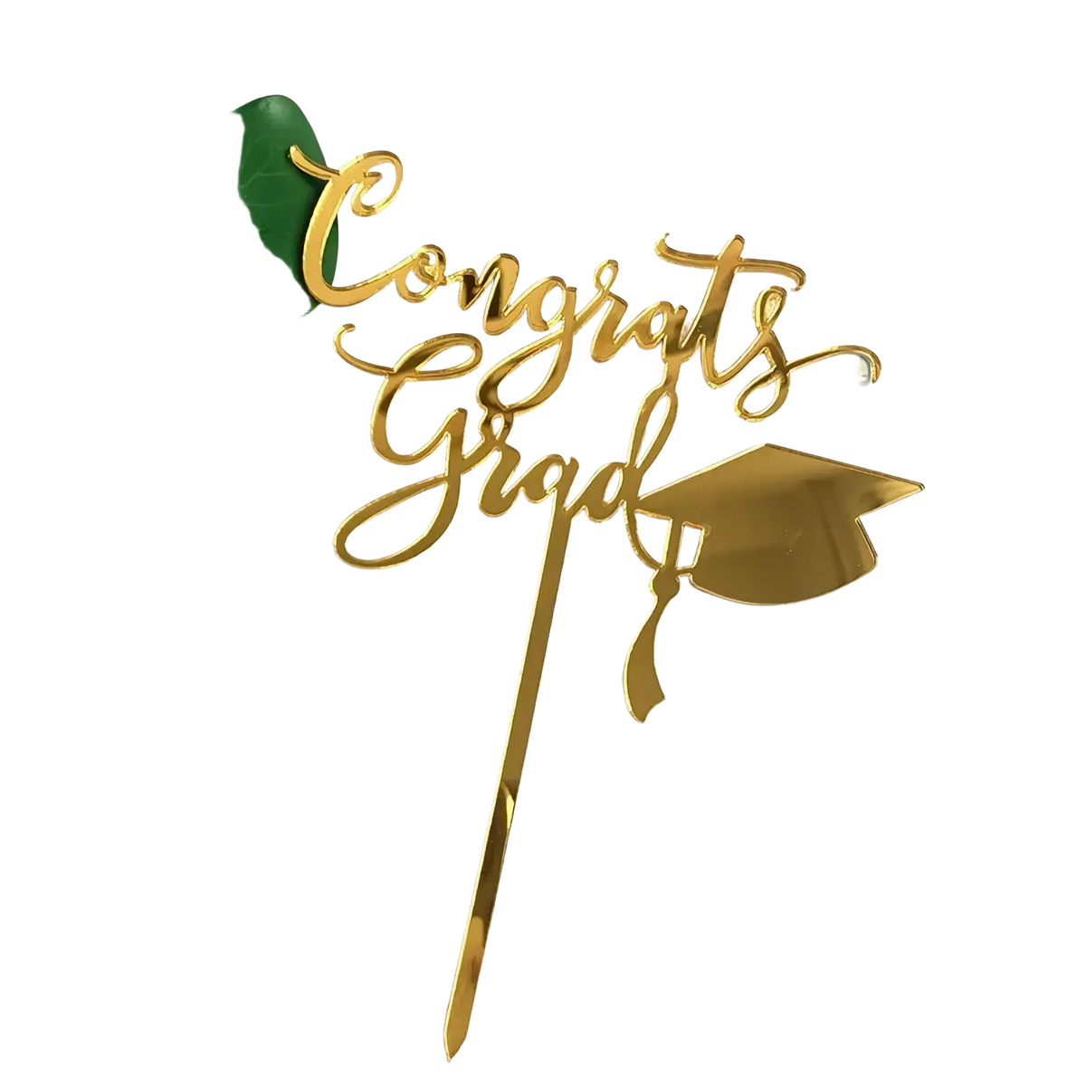 Gold acrylic graduation cake topper in cursive with congrats grad and a graduation cap design