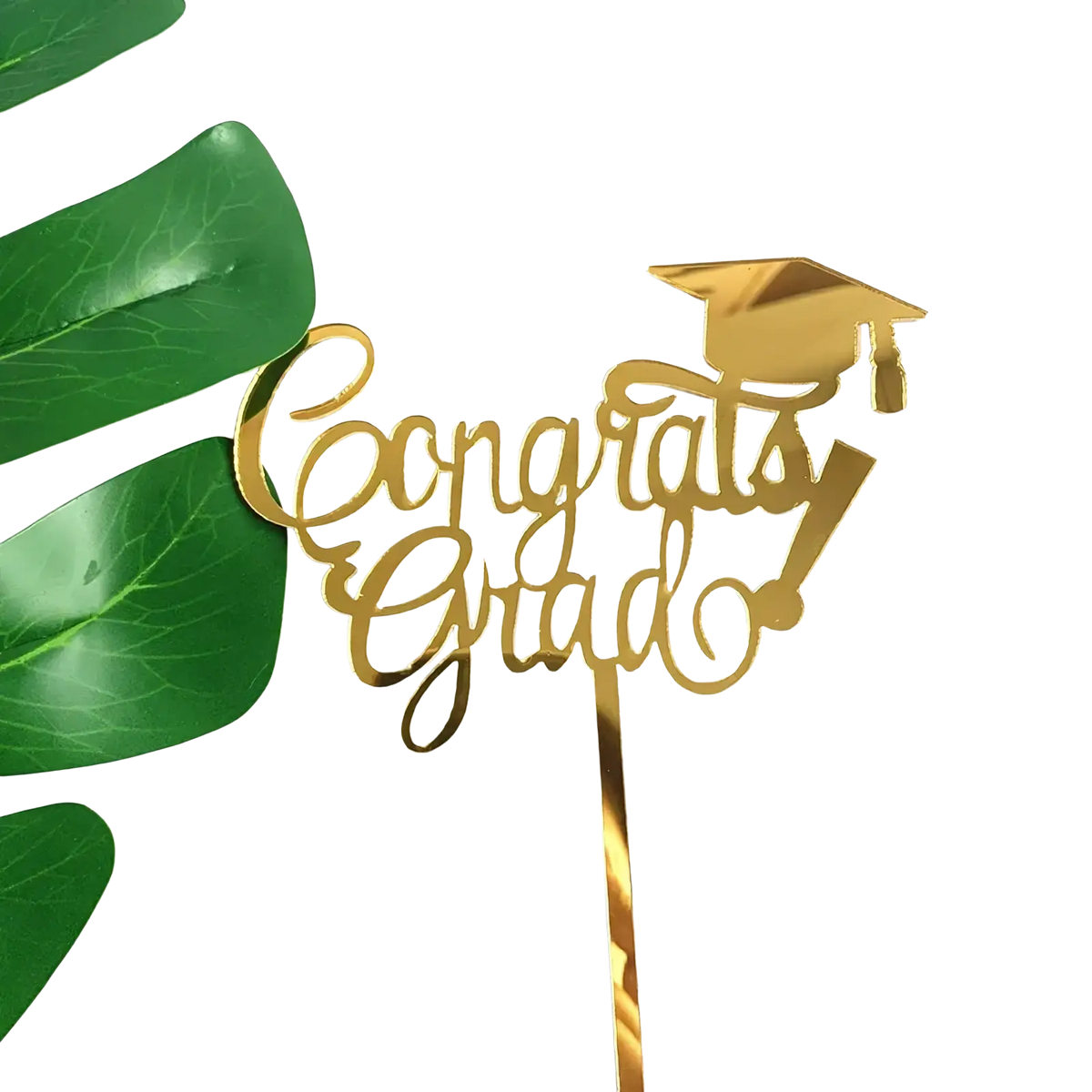 Gold acrylic graduation cake topper featuring a metallic gold congrats grad design with a graduation cap motif