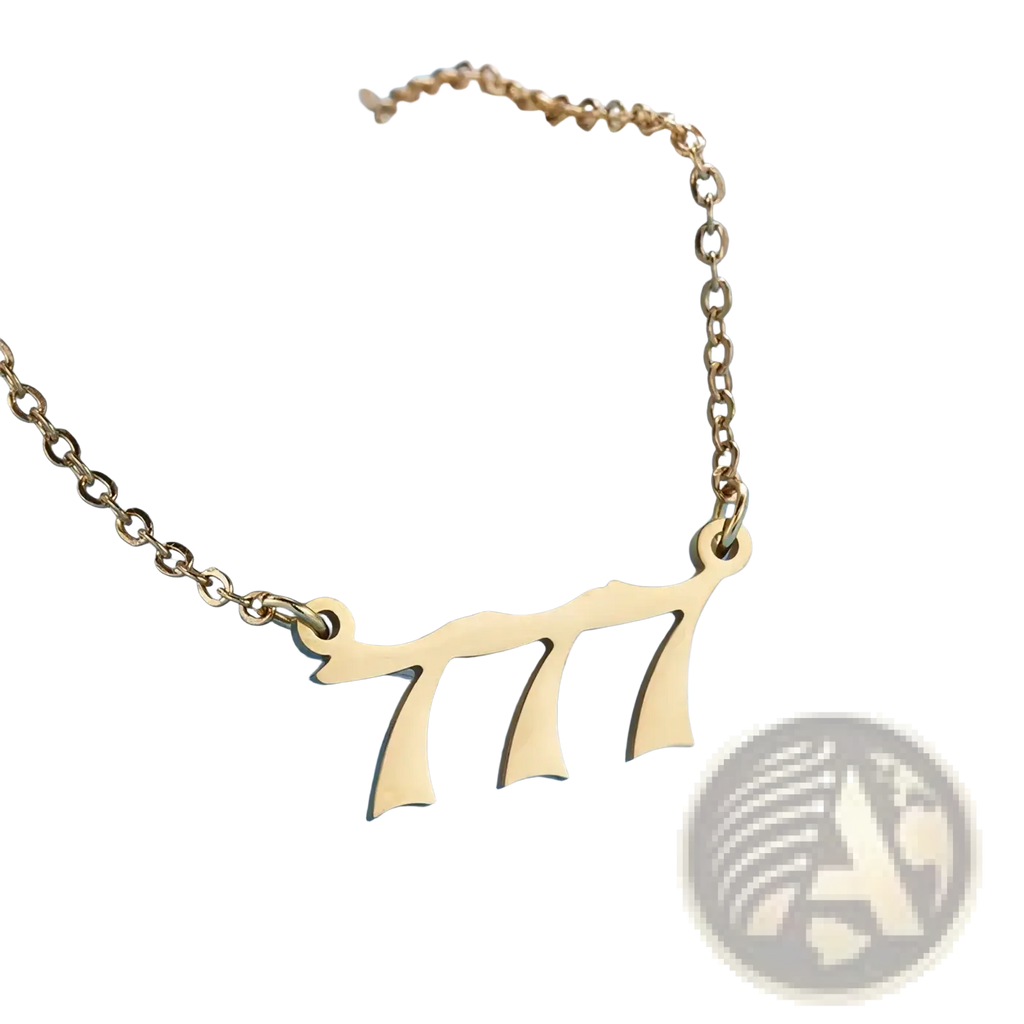 Gold angel number 7 necklace featuring a gold-toned delicate chain with a hebrew letter shin pendant