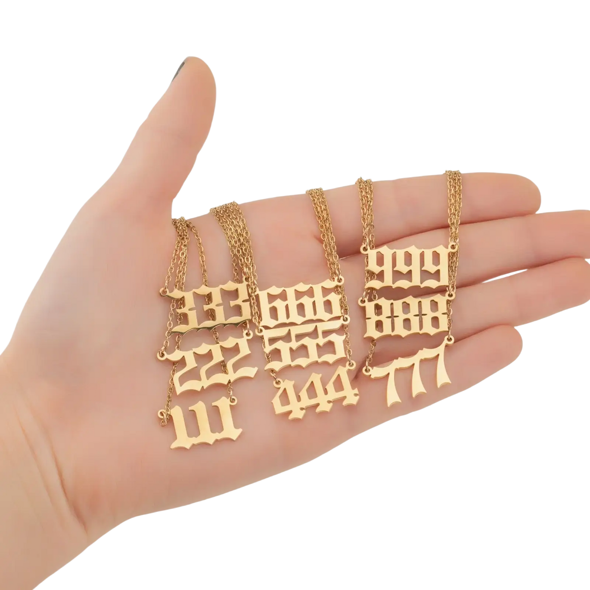 Gold angel number 7 necklace featuring gold-toned pendants with bold gothic-style numerals like 133 222 and 999
