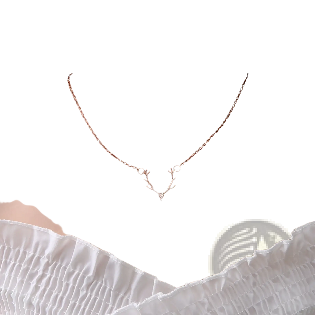 Gold antler gemstone pendant clavicle necklace in delicate rose gold with a small diamond at its center