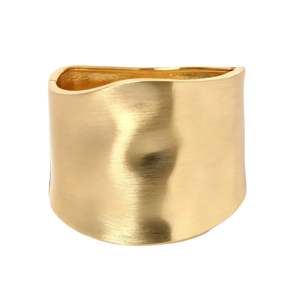 Gold asymmetric wide bangle bracelet with gold-toned brushed metallic finish and slightly curved edges