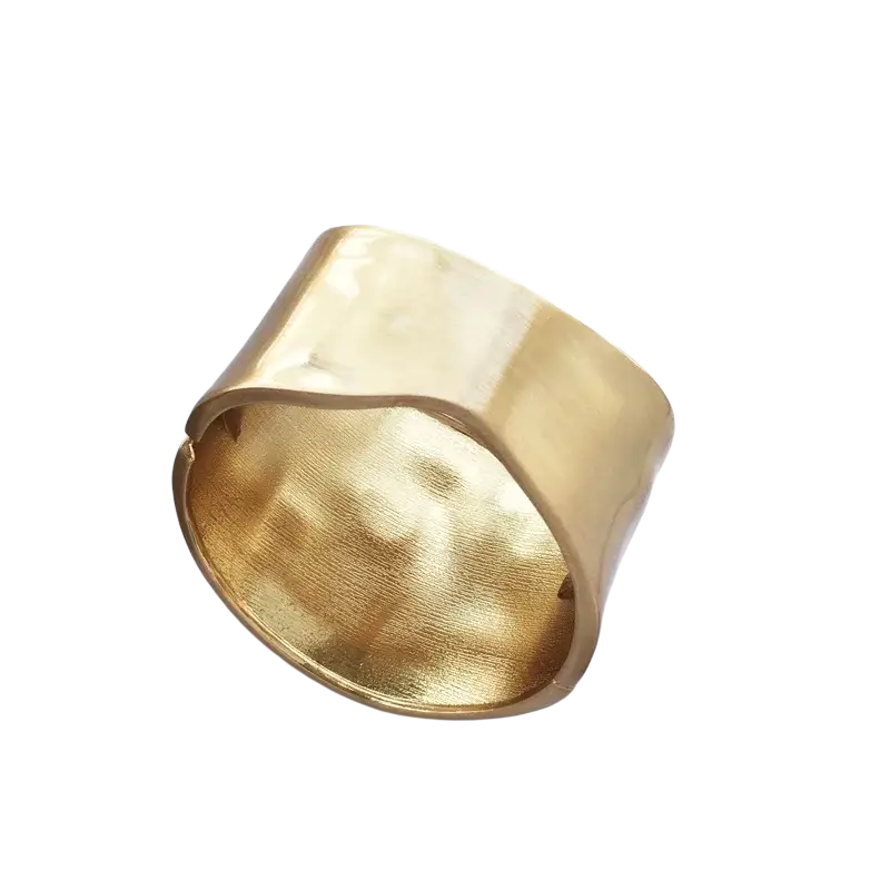 Gold asymmetric wide bangle bracelet with gold-toned hammered texture and sleek modern design