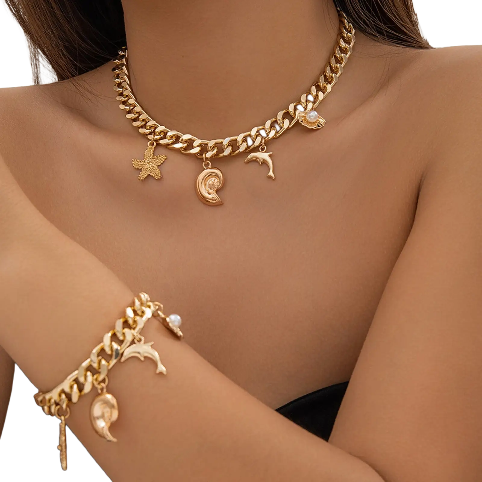 Gold boho sea charm choker and bracelet set with gold-toned chunky chain and sea-themed charms including starfish dolphin and seashell