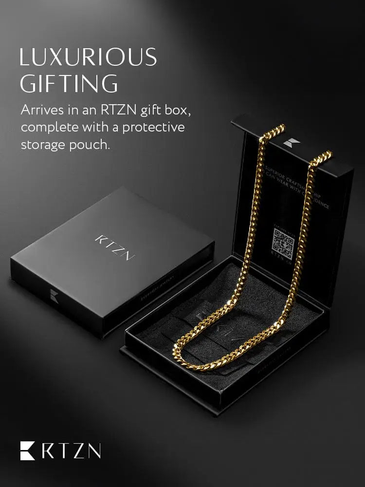 18k gold plated 5mm stainless steel Cuban link necklace in a gold color presented in a sleek black rtzn gift box